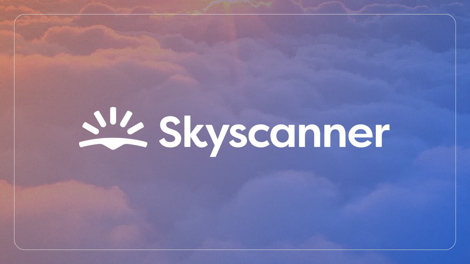 View of sun-warmed clouds from above with a few rays of sunshine and the "Skyscanner" business logo atop the clouds.